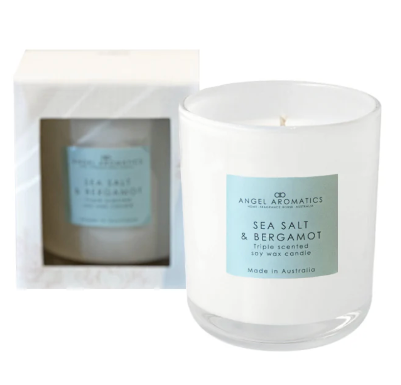 Vanilla coconut scented candle in glass jar by Angel Aromatics – perfect for relaxation