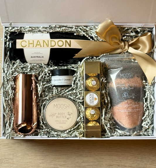 Luxury bath gift box with Chandon sparkling, bath soak, body butter, soy candle, Ferrero Rocher chocolates, and copper flute – Bath and a Half by The Gifting Suite