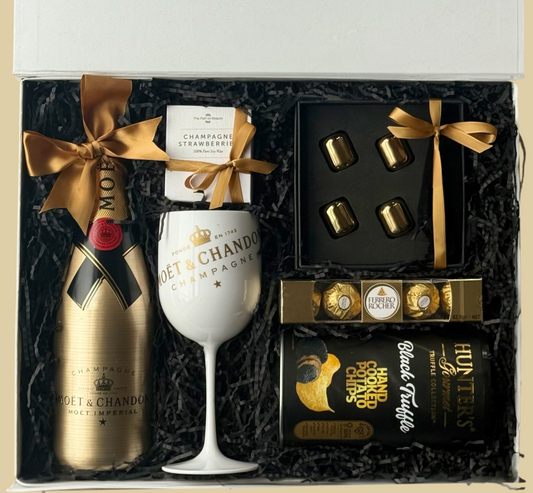 The Golden Celebration luxury gift box with Moët & Chandon champagne and gourmet treats