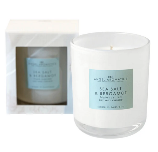 Vanilla coconut scented candle in glass jar by Angel Aromatics – perfect for relaxation
